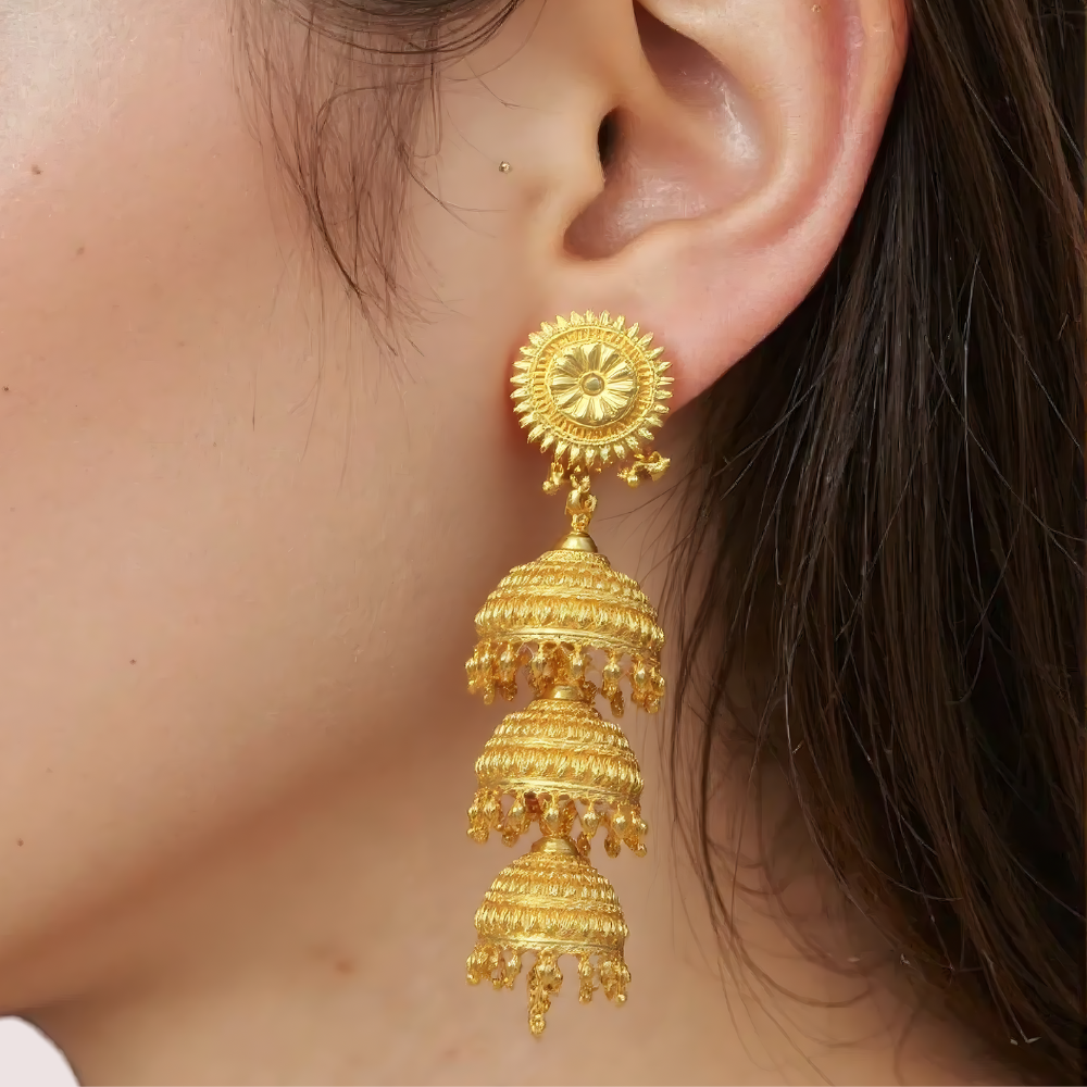 8mDqP1UiK1uNKvWRTKjBs57AY2a4cUSKR8SkczDa.png Triple-Tiered Gold Jhumka Earrings - Image 1