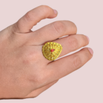 Golden Teardrop Ring with Red Accent
