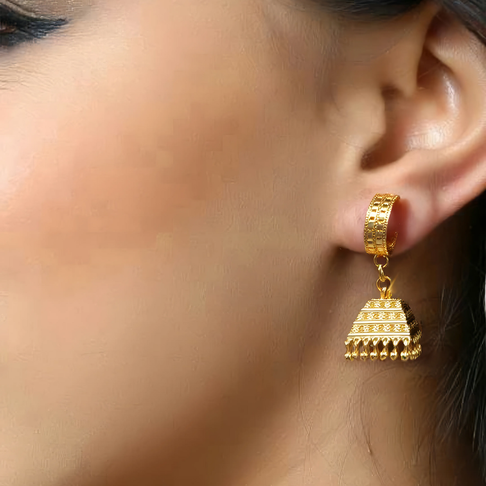 dFxP9ZNYnq3d19hkh6IrCnsaV5C7iFlNlnOnT2s7.png Elegant Gold Pyramid Jhumka Earrings - Image 1