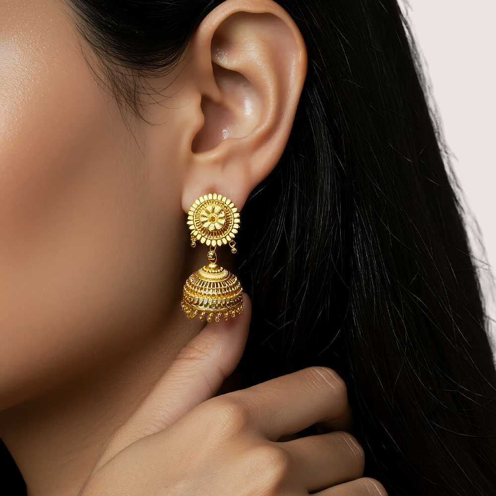 yzxT1ImsZLA7TD7BW4uBpvf6ivoqnIAwgE45DcNE.png Classic Gold Jhumka Earrings with Floral Motif - Image 1